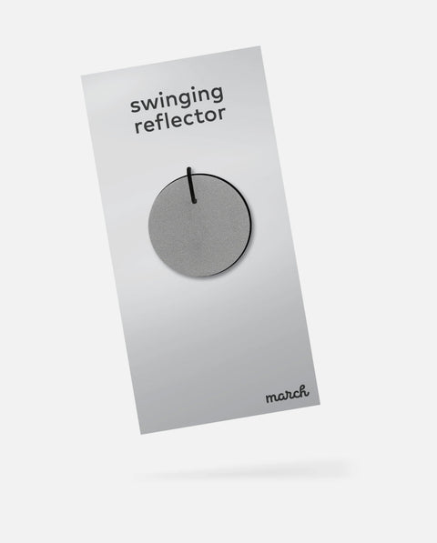 Swinging reflector - round
